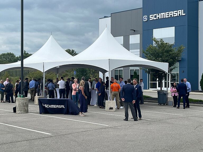 photo, visitors at the grand opening reception