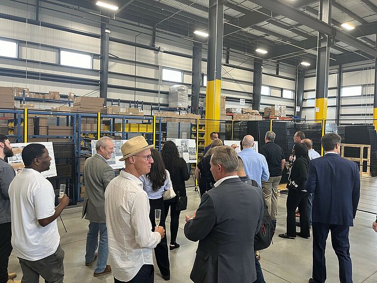 photo, visitors at the grand opening reception