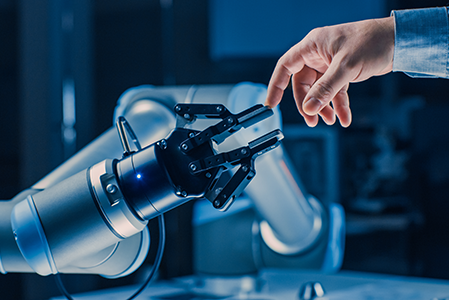 Cobot arm and human hand touching